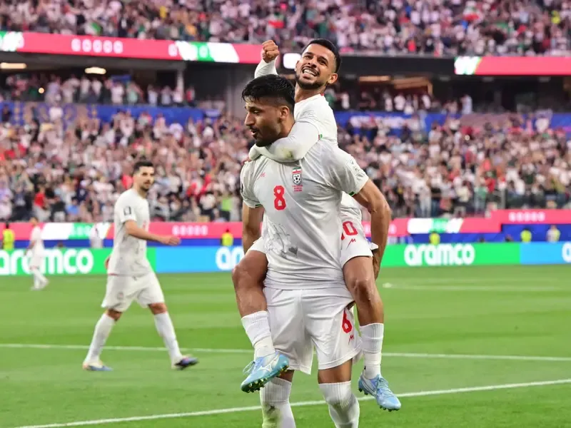 Iran's Mohammad Mohebi Gun Celebration: FIFA 2026ରେ ହାଇଡ୍ରାମା, ଇରାନ ଖେଳାଳିଙ୍କ ବିବାଦୀୟ 'ବନ୍ଧୁକ' ସେଲିବ୍ରେସନ୍, ଆକ୍ସନ୍ ନେବ କି ଫିଫା?